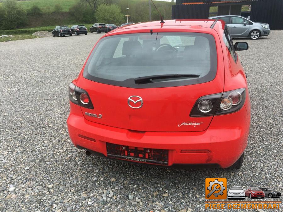 Amortizor capota mazda 3 2010