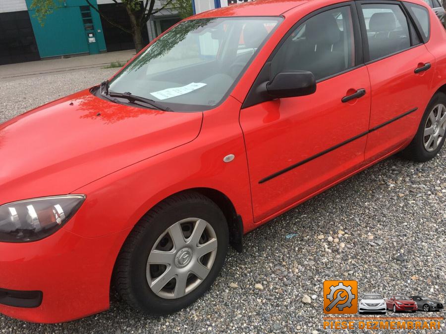 Amortizor capota mazda 3 2010