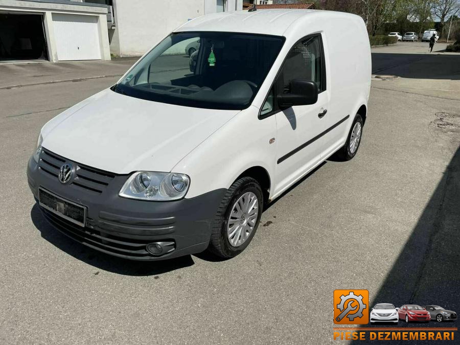 Macara geam volkswagen caddy 2009